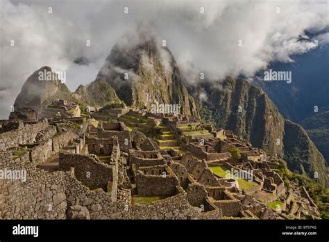 Morning Fog And Clouds Reveal Machu Picchu The Ancient Lost City Of