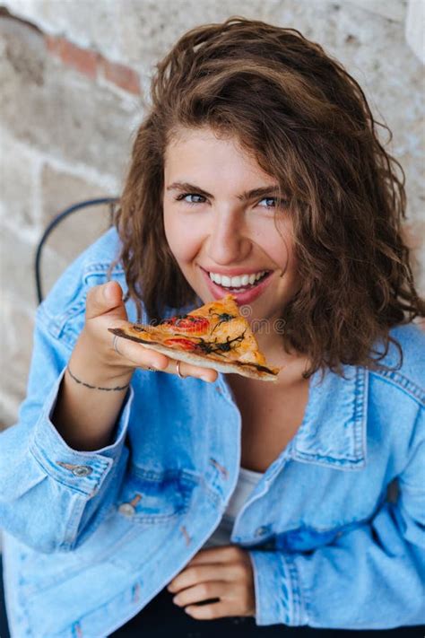 pizza time pretty smiling woman eating pizza in the restaurant stock image image of adult