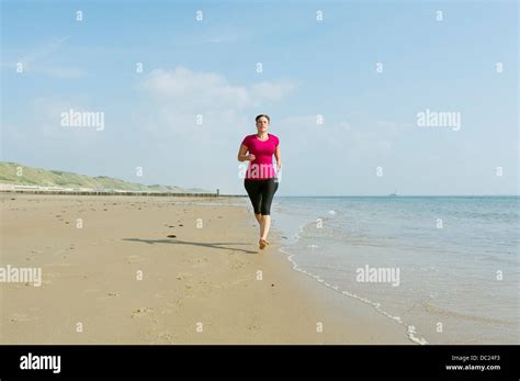 Woman On Beach Woman On Beach Hi Res Stock Photography And Images Alamy