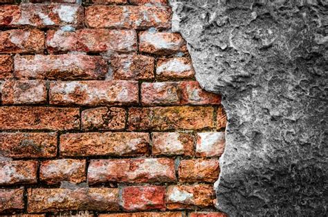 Premium Photo Brick Wall With Cracked Concrete