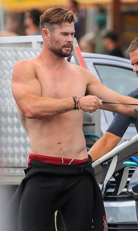 Chris Hemsworth Shows Off His Incredible Physique While Surfing In Byron Bay