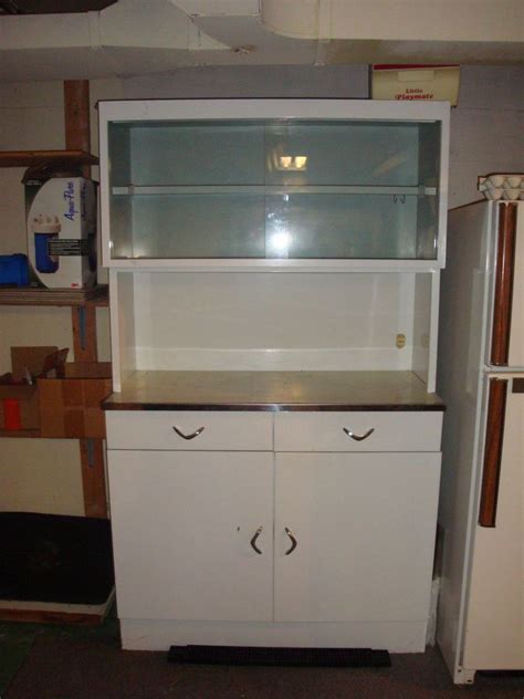 In addition, these great looking cabinets were easy to care for, low in cost, and for the most part, came in white. Vintage Retro White Metal Kitchen Cabinet Storage Cupboard ...