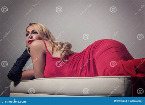 Seductive Blonde Woman In Red Dress Stock Image Image Of Sensuality