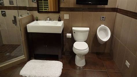 Bathroom With Toilet And Urinal Urinal In Home Bathroom Dream