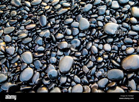 Shiny Pebbles On Beach Hi Res Stock Photography And Images Alamy