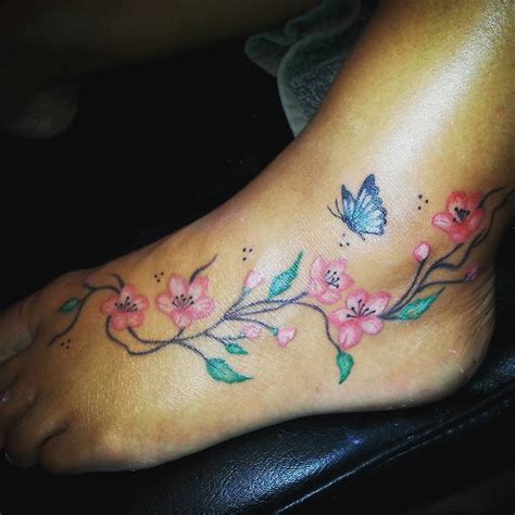 Colourful Girly Foot Tattoo Butterflies Flowers And Vines Flower Tattoo Foot Butterfly Foot