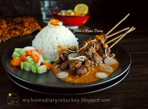Not cooked, just ground together into a thick paste. Indonesian Lamb or mutton satay with peanut sauce / Sate ...