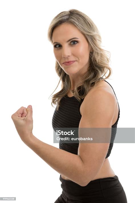 Fit Woman Flexing Muscle Stock Photo Download Image Now Flexing