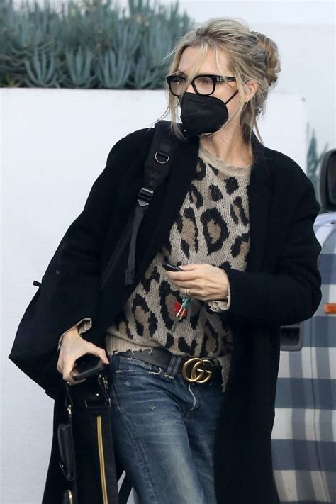 Michelle Pfeiffer In A Leopard Sweater With A Gucci Belt In Santa