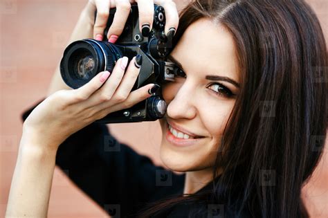 Beautiful Female Photographer Posing With Camera Stock Photo 188482