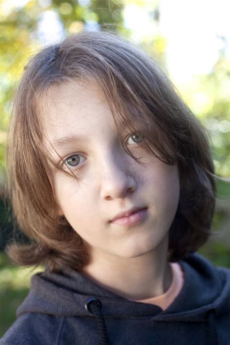 Portrait Of A Boy With Brown Hair Outdoors Stock Image Image Of Hair