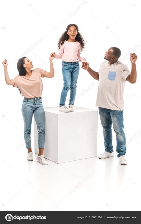 Happy African American Parents Holding Hands Cheerful Daughter Standing