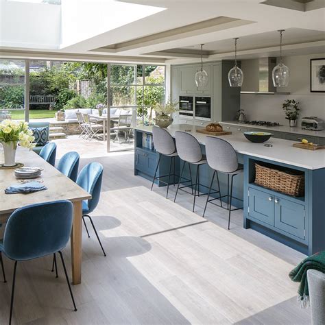 Open Plan Kitchen Diner With Blue Island And Cabinetry Open Plan
