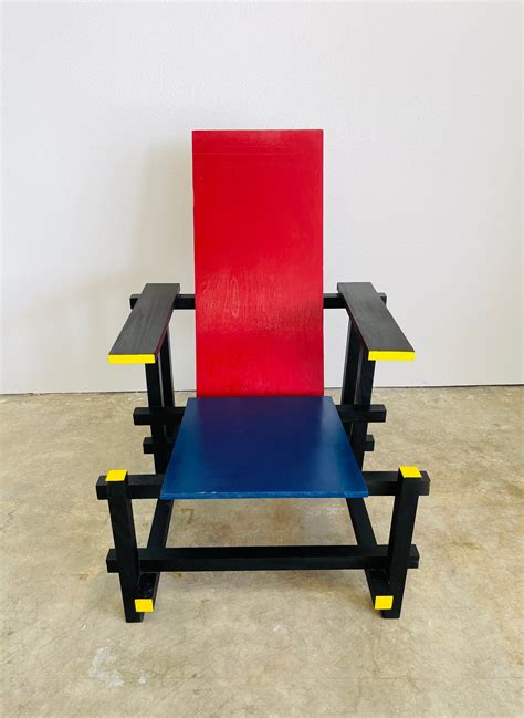 Red And Blue Chair By Gerrit Rietveld