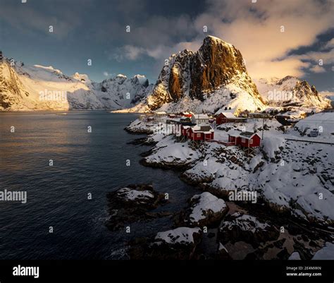 Winter Sunrise At The Picturesque Hamnoy Villagem With Traditional Red