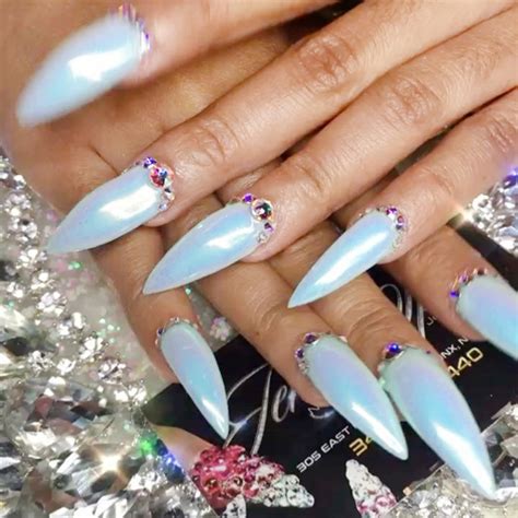 Cardi b with her nail artist, jenny bui (photo: Cardi B Light Blue Nail Art, Studs Nails | Steal Her Style