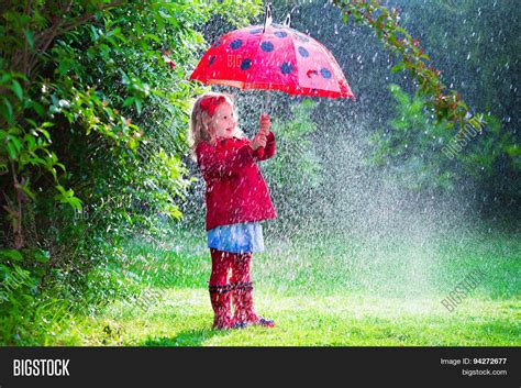 Little Girl Umbrella Image And Photo Free Trial Bigstock