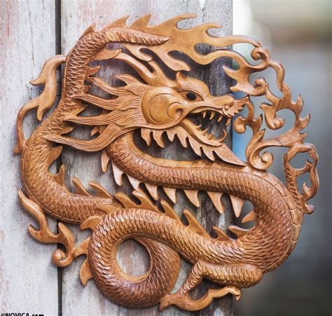 Relief carving is a type of wood carving in which figures are carved in a flat panel of wood. Wood relief panel, 'Twilight Dragon' | Wood carving art ...