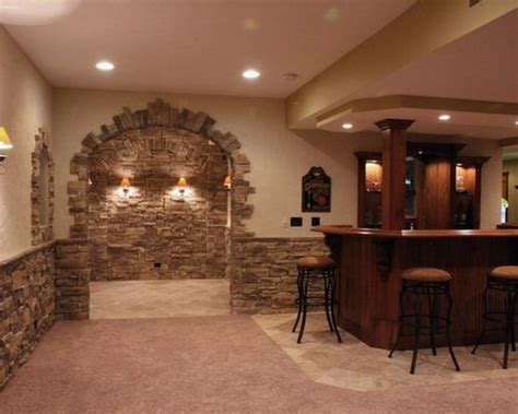 A neutral wheat toned fabric will make this spacious chair and a half a cozy and stylish addition to your living space. Image result for stack-stone half wall | Basement design ...