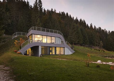 Grass Ramps Over The Curving Form Of This House In The French Countryside Architecture