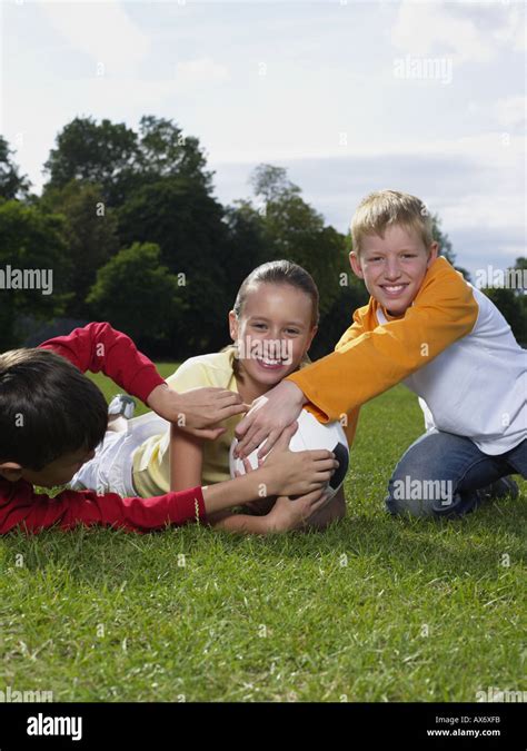 Children Playing In The Park Stock Photo Alamy
