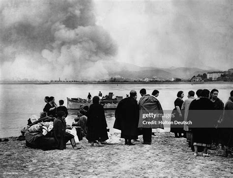 Spanish Refugees Watch Their Home Town Of Irun Burn In The Distance