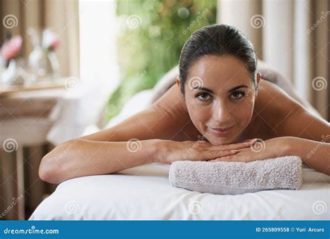 You Really Should A Massage Portrait Of An Attractive Woman Resting On A Massage Table Stock