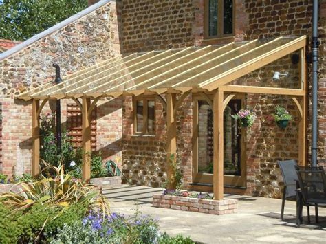 This Glazed Roof Pergola Blends In Perfectly With The Barn Conversion