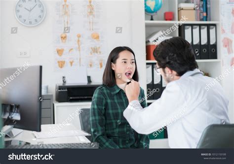 Doctor Examining Patients Oral Cavity Stock Photo 1012110199 Shutterstock