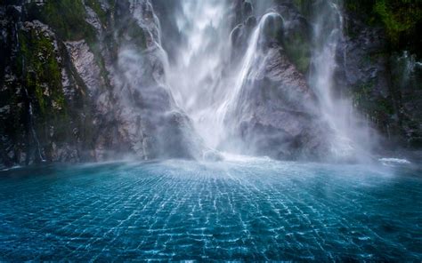 Gorgeous Waterfall In Milford Sound New Zealand