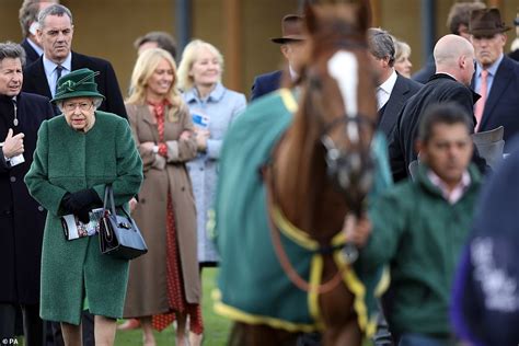 Queen Dazzles In Emerald As She Shares Joke With Veteran Jockey Frankie