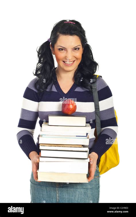 Happy Student Woman Holding Pile Of Books And An Apple And Smiling