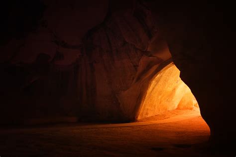 Image Of Beautiful Golden Light Through The Cave Entrance Stock Photo