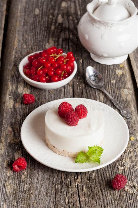 Cheesecake With Fresh Raspberries And Mint Leaves Stock Image Image