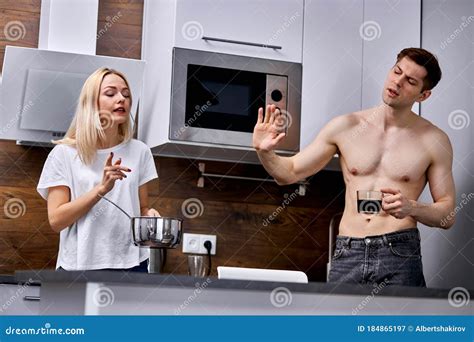 Man Dissatisfied With What His Wife Is Cooking Stock Image Image Of Displeased Bedroom 184865197