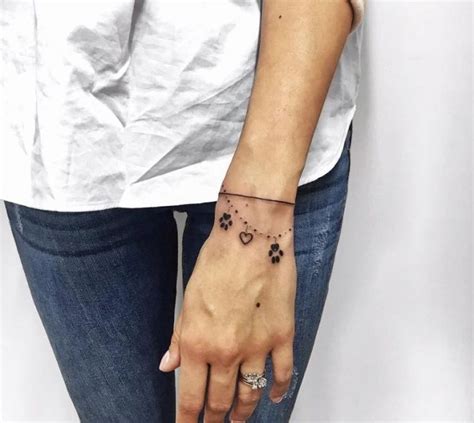 They are also very elegant especially when placed on particular position of the body. The 80+ Cutest Paw Print Tattoos Ever - The Paws in 2020 | Pawprint tattoo