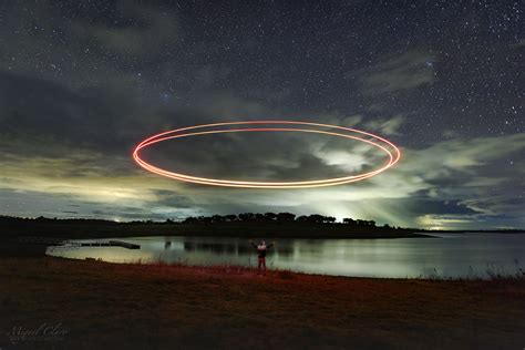 An Ufo Light Painting Against The Sky Of Alqueva Lake