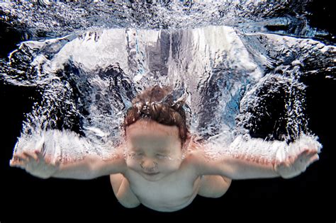 Swim Lessons And Dunking Young Children