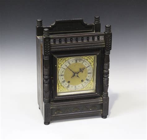 A Late 19th Century German Ebonized Walnut Mantel Clock With Eight Day