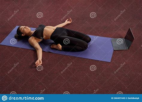 Girl Practicing Yoga On Yoga Mat Stock Image Image Of Alone Lying