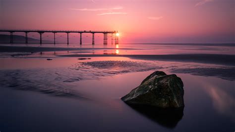 Beautiful Silhouette Background Purple Sky Bridge Ocean Stone During