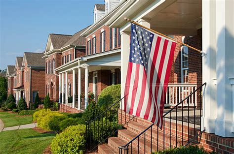 House With American Flag Stock Photos Pictures And Royalty Free Images