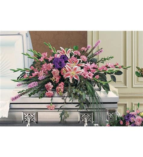 Maybe you would like to learn more about one of these? blue and orange casket spray - Google Search | Funeral ...