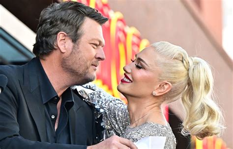 gwen stefani and blake shelton share pda in festive holiday video parade