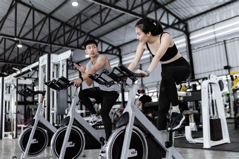 Exercise Concept The Well Shaped Lady And The Muscular Man Being Entertaining Having Small Chat