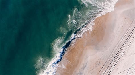 Download Wallpaper 1366x768 Ocean Aerial View Surf Sand Foam Water