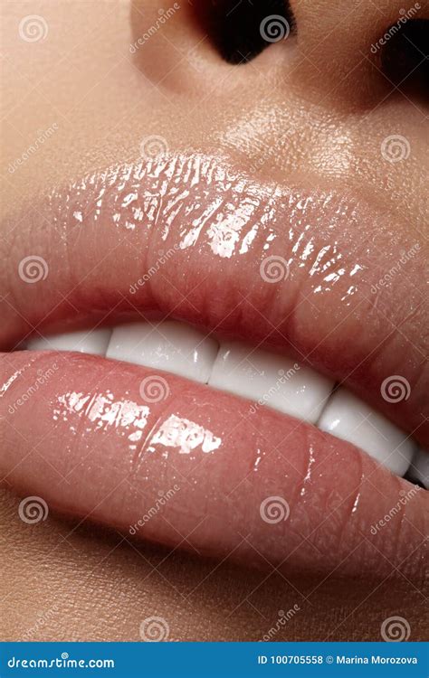 Moisturizing Lip Balm Lipstick Close Up Of A Beautiful Wet Lips Full Lips With Gloss Makeup