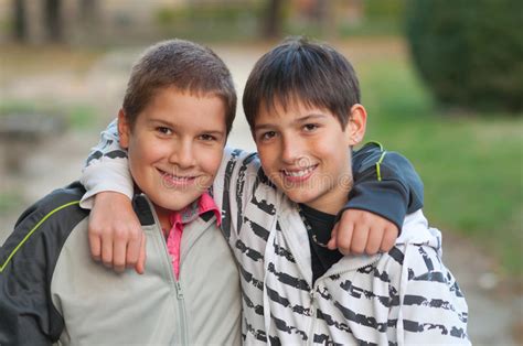 Teenage Friends Hugging Each Other Stock Photo Image Of