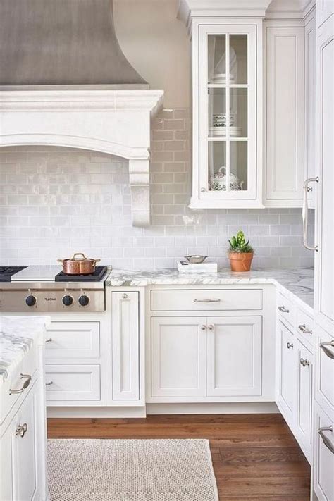 Check out our kitchen sinks and faucets for an extra accent. 70+ Stunning White Cabinets Kitchen Backsplash Decor Ideas ...