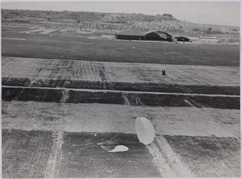 French Air Force Parachute Parachutist Landing To Earth With Two